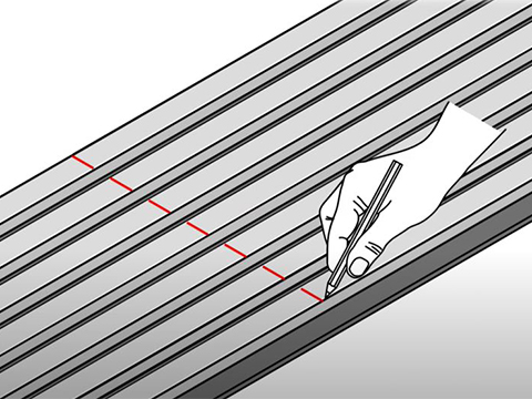 Tracer les repères sur le mur pour fixer la structure métallique